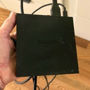 Amazon 4K HDR  Fire TV with wall charger and HDMI cable. Model no. DV83YW